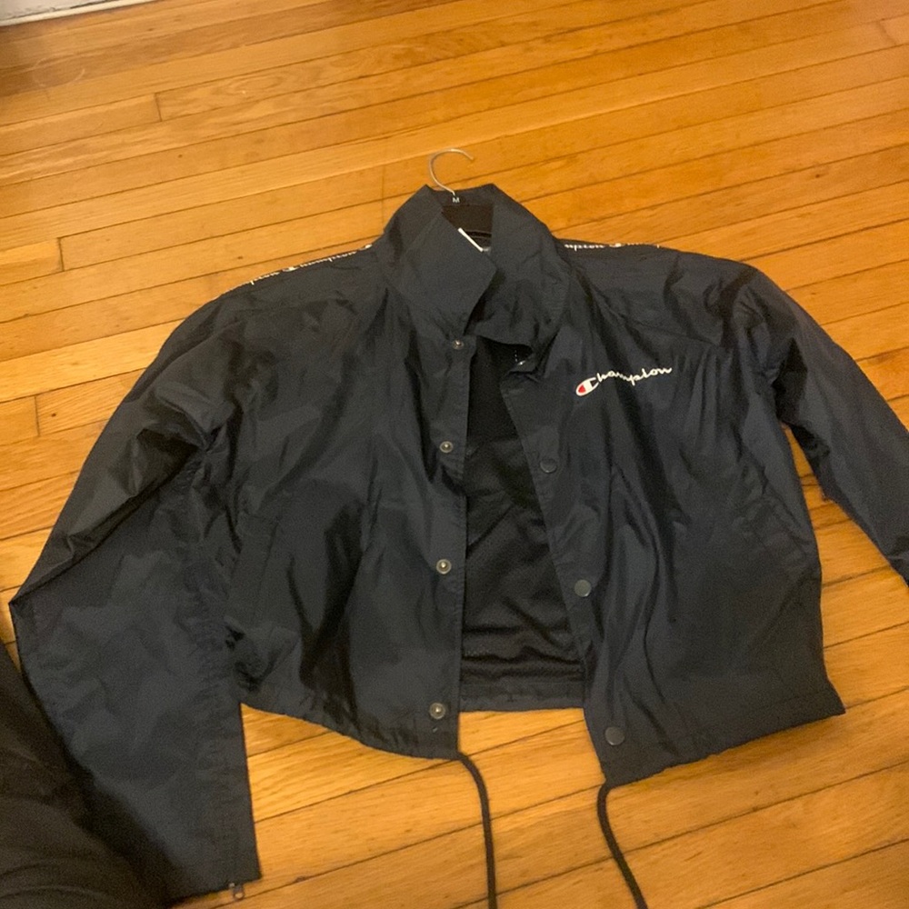 Rain jacket/ windbreaker